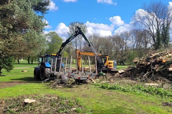 Dobells Professional Tree Care & Arboricultural Contractors | Crane Assisted Tree Work | tractor and excavator