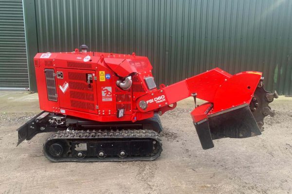 Dobells Professional Tree Care & Arboricultural Contractors | Crane Assisted Tree Work | Red chipper