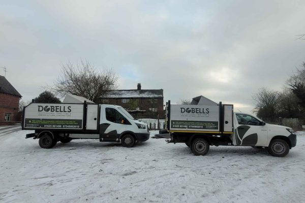 Dobells Professional Tree Care & Arboricultural Contractors | Crane Assisted Tree Work | Dobells vans in snow